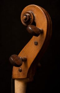 side angled view Venetian baroque cello scroll